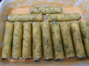 Cannelloni ripieni di ricotta e minestra maritata con besciamella alla zucca