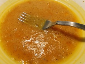 calamaro imbottito con friarielli provola e noci su polenta alla curcuma