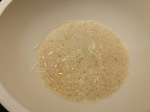 Baccalà in pastella allo zafferano su fonduta al cognac