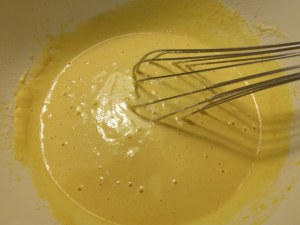 Baccalà in pastella allo zafferano su fonduta al cognac