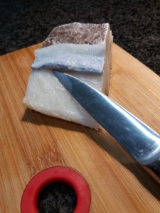 Baccalà in pastella allo zafferano su fonduta al cognac