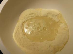 Lasagna vegetariana con ricotta alle olive nere e frutta secca