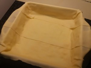 Lasagna vegetariana con ricotta alle olive nere e frutta secca