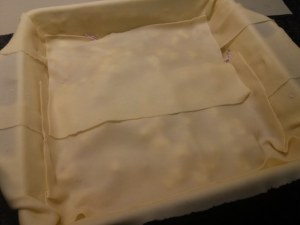 Lasagna vegetariana con ricotta alle olive nere e frutta secca