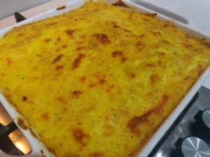 Lasagna vegetariana con ricotta alle olive nere e frutta secca