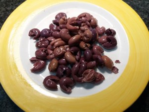 Lasagna vegetariana con ricotta alle olive nere e frutta secca