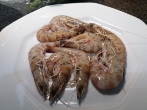 Bucatini lardiati con piselli pomodori secchi e mazzancolle