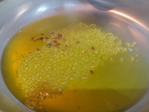 Spaghetti aglio olio e peperoncino con purpu ammuddicato su crema di friarielli