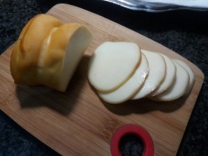 Parmigiana di melanzane ed alici con pomodoro giallo e tarallo sbriciolato
