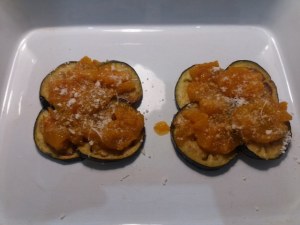 Parmigiana di melanzane ed alici con pomodoro giallo e tarallo sbriciolato