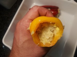 Peperoni ripieni con olive capperi provola ed acciughe di Sciacca