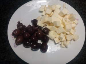 Peperoni ripieni con olive capperi provola ed acciughe di Sciacca