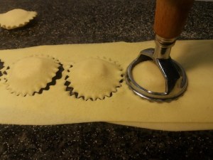 Ravioli ripieni di ricotta e mortadella con zucca e porcini