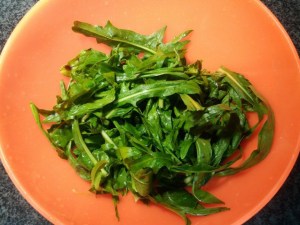 Timballo di tagliatelle con puntarelle salsiccia e crema di parmigiano allo zafferano