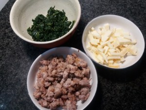 Timballo di tagliatelle con puntarelle salsiccia e crema di parmigiano allo zafferano