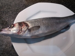 Filetto di spigola in crosta di pistacchi con emulsione al miele di castagno