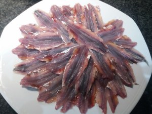 Sformato di alici in crosta di mandorle con salsina al limone