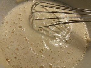 Fiori di zucca in pastella allo zafferano ripieni di ricotta di bufala provola e pesto di pistacchi
