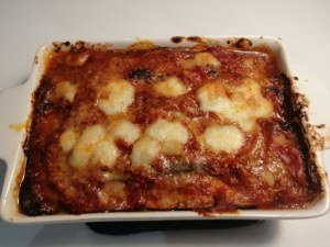 Parmigiana di melanzane e pesce lampuga