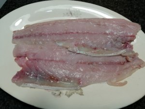 Parmigiana di melanzane e pesce lampuga