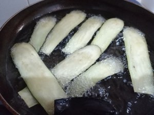 Parmigiana di melanzane e pesce lampuga