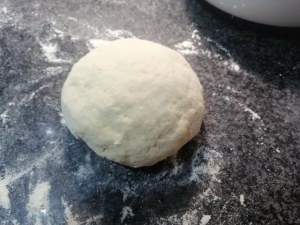 Gnocchi con crema di zucca filetti di acciughe olive schiacciate finocchietto e bottarga di tonno