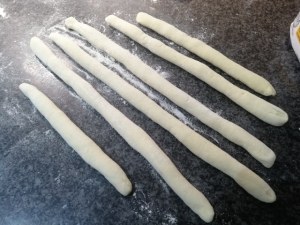 Gnocchi con crema di zucca filetti di acciughe olive schiacciate finocchietto e bottarga di tonno