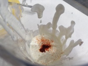 Polpette alla nocciola e riduzione di vino passito su crema di burrata allo zafferano