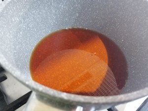 Polpette alla nocciola e riduzione di vino passito su crema di burrata allo zafferano