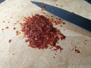 Pasta e piselli con provola e polvere di prosciutto crudo