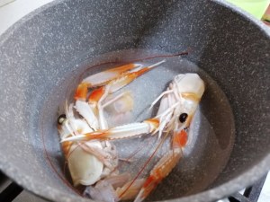 Scialatielli con scampi e zucchine in duplice fioritura