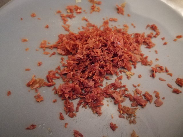 Risotto con zucca noci gorgonzola e polvere di prosciutto crudo