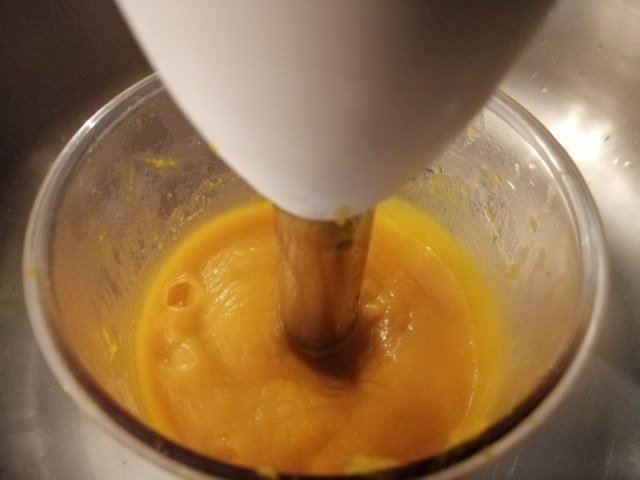 Risotto con zucca noci gorgonzola e polvere di prosciutto crudo