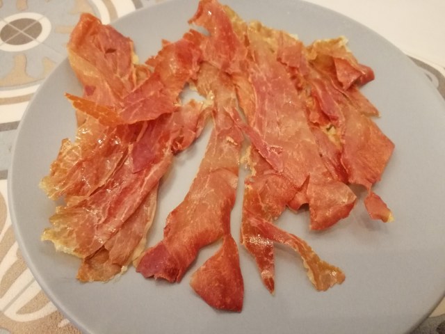 Risotto con zucca noci gorgonzola e polvere di prosciutto crudo