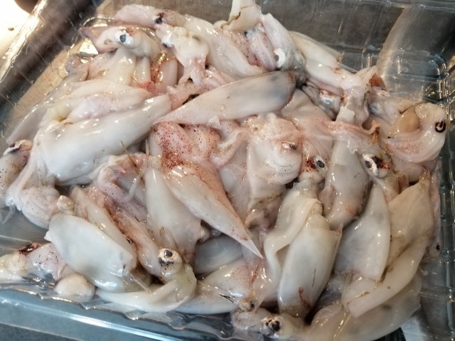 Fettuccine con calamarelle stracciatella di bufala e datterini