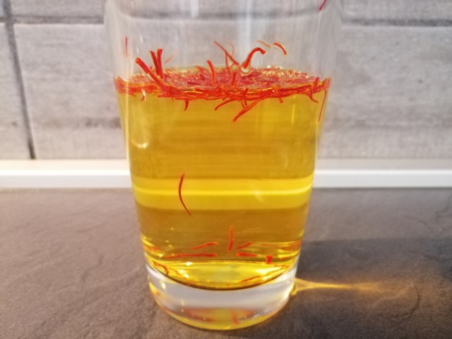 Risotto allo zafferano con zucchine e quartirolo stagionato