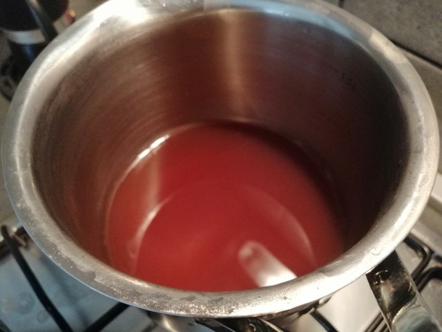 Polpo glassato allo zenzero su riduzione del suo brodo