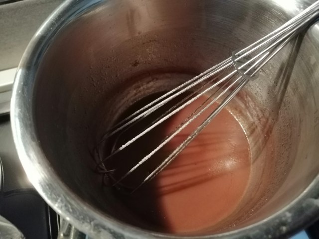 Polpo glassato allo zenzero su riduzione del suo brodo