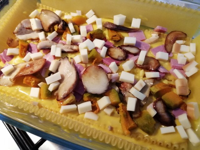 Lasagna riccia ai porcini con besciamella alla zucca cotto e provola