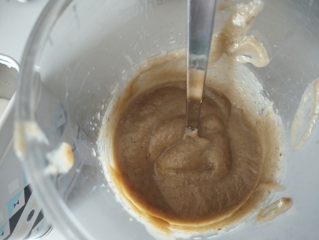 Risotto con crema di melanzana polvere delle sua buccia pomodorini semi dry provola e crema di parmigiano