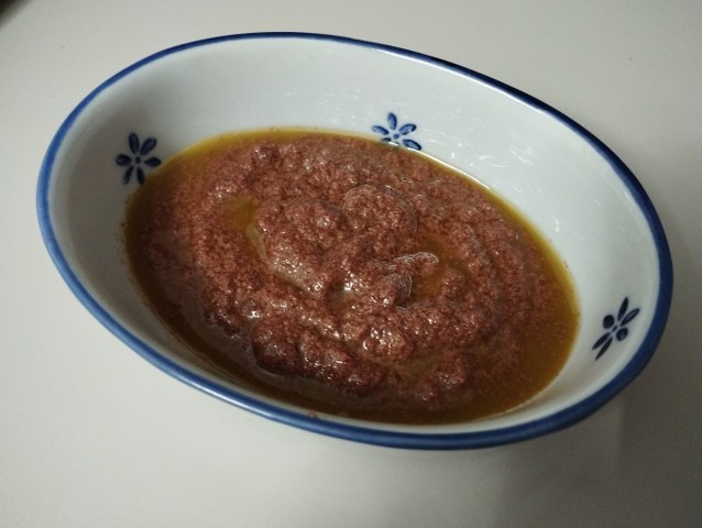 Torre di farinata di ceci con sardine e pate di olive taggiasche