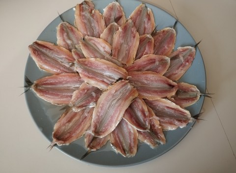 Torre di farinata di ceci con sardine e pate di olive taggiasche